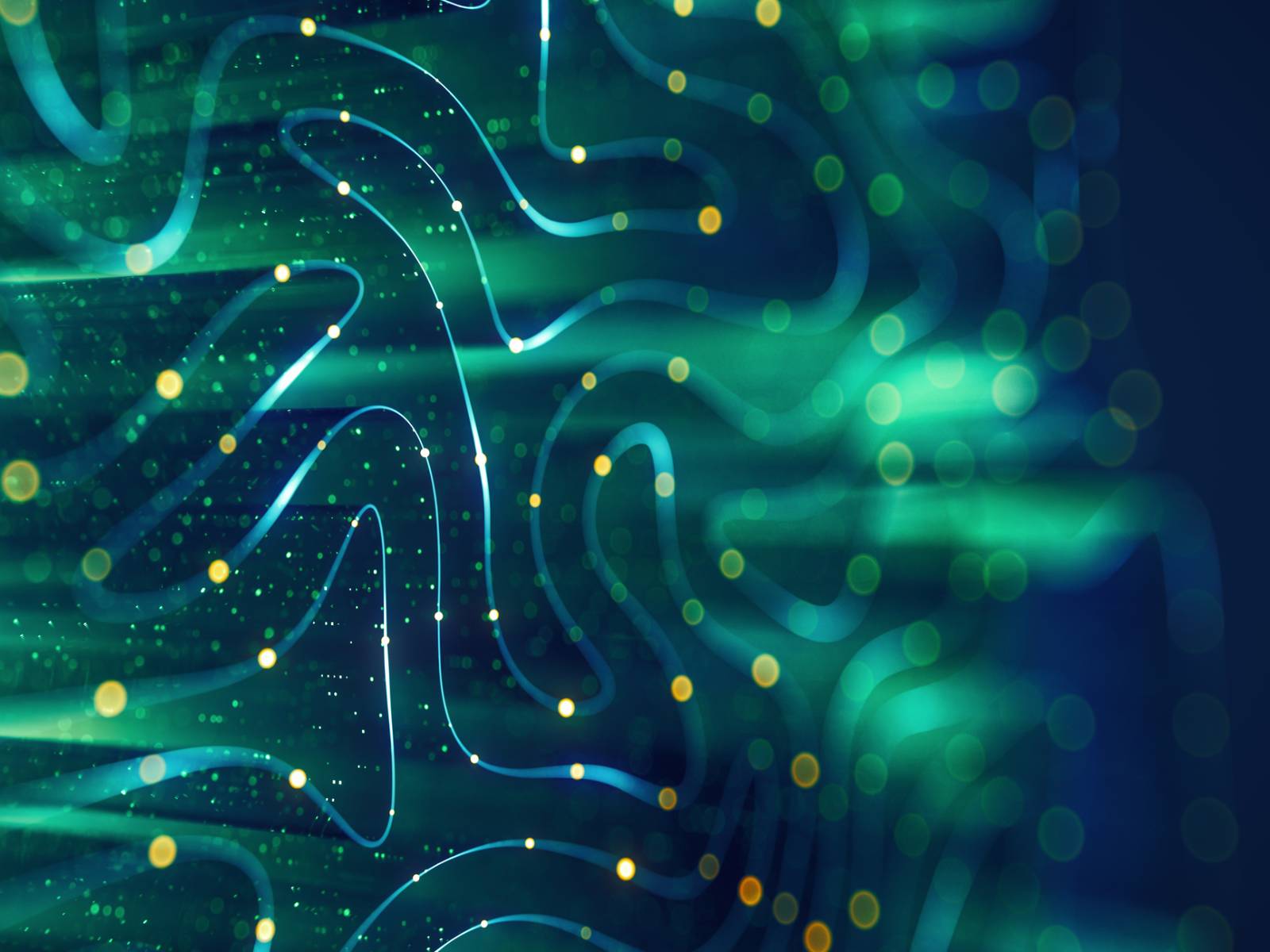 Fondo de tecnología con líneas fluidas y partículas de luz. Foto: iStock